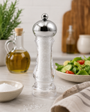 A Bisetti capri pepper mill with a polished chrome  top and a visible salt level window, styled on a kitchen counter-Bisetti-USA