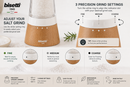 Bisetti precision ceramic salt grinder with a natural beechwood base, shown on a light beige background with instructional text and diagrams explaining the three grind settings.